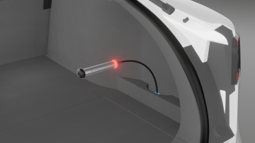WLT 13.S flexible spring-based attachment used as a probe and adapter with WLTe tester to detect water ingress in automotive interiors, confirmed by light and sound alert